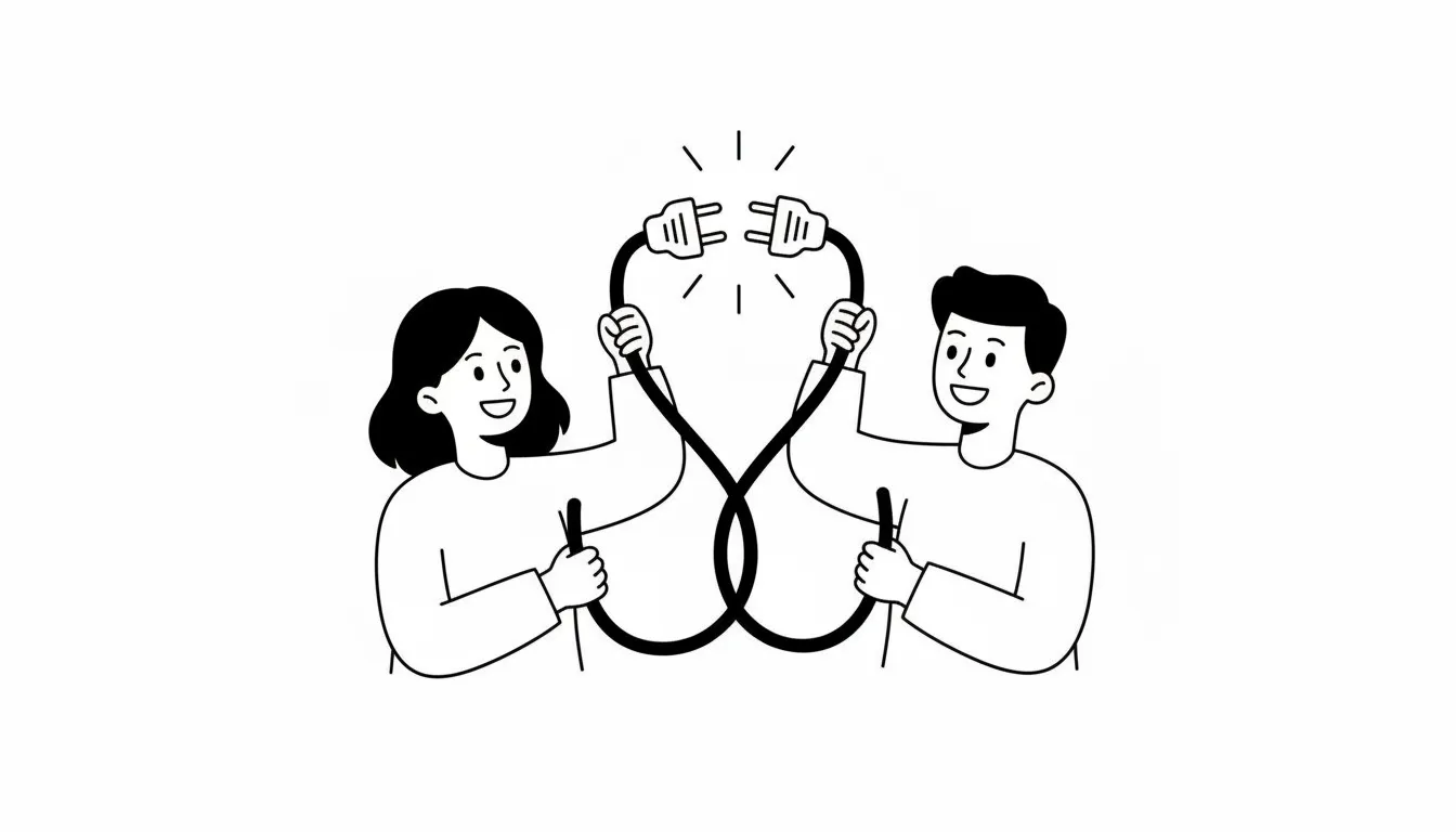 Pareja conectando cables eléctricos juntos, en blanco y negro.